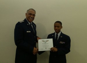 Maj Gen Carr presents Cadet Arshad White the Wright brothers award    